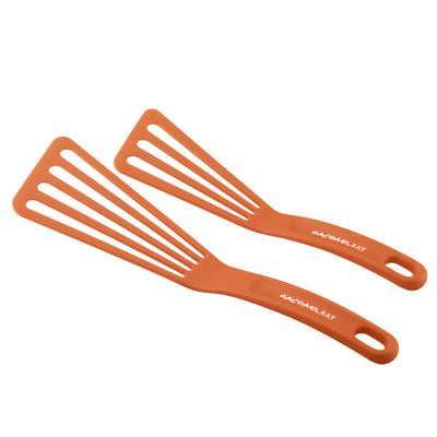 Two orange slotted spatulas with brand logo on the handles.