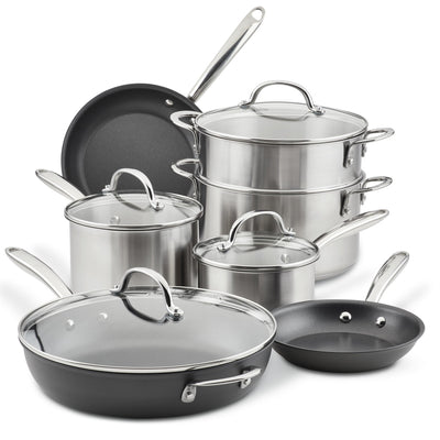 Stainless steel cookware set with pots, pans, and lids.