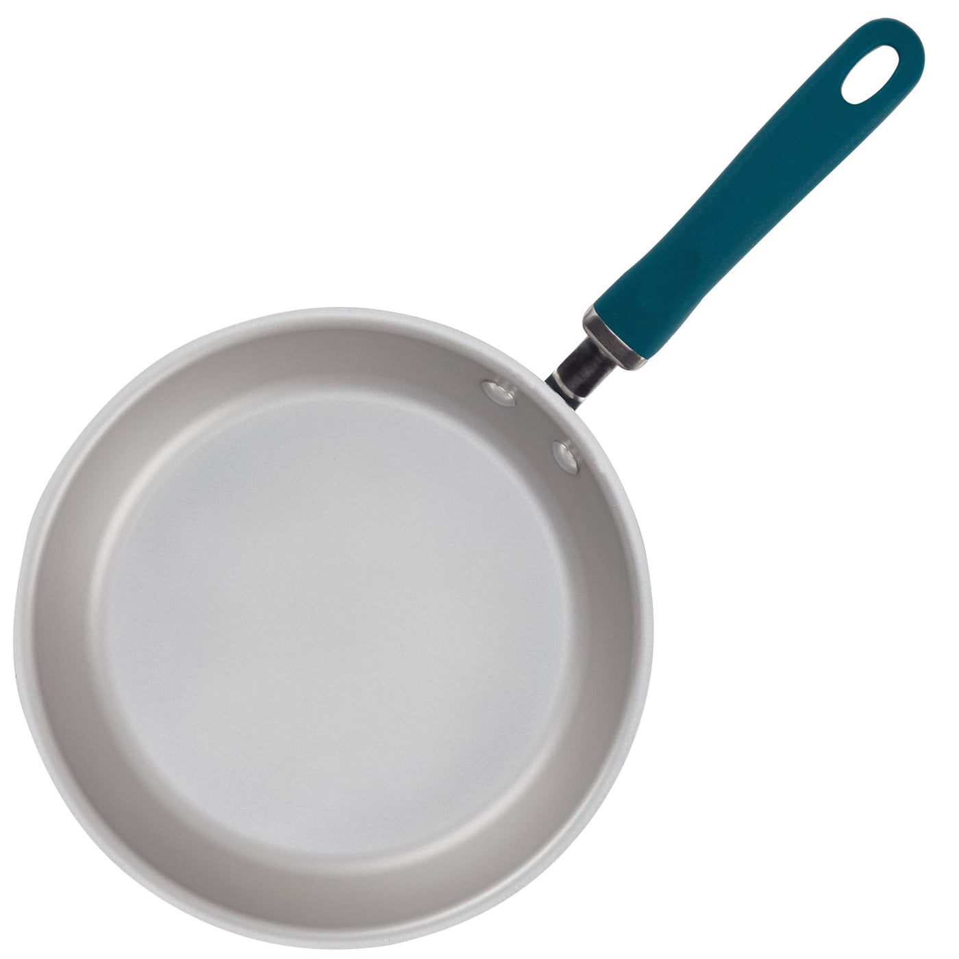 A white frying pan with a dark handle, viewed from above.