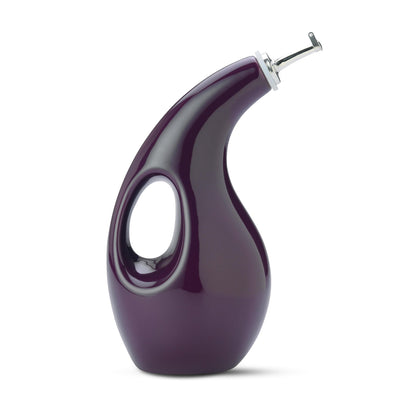 Purple ceramic oil dispenser with a curved design and handle.