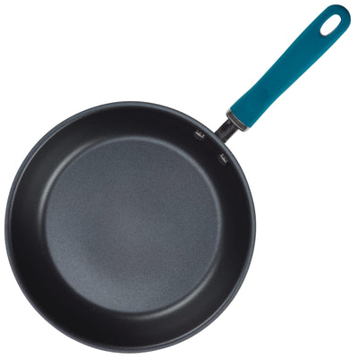 A non-stick frying pan with a blue handle.