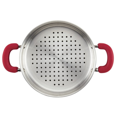 A metal colander with red handles, viewed from above.