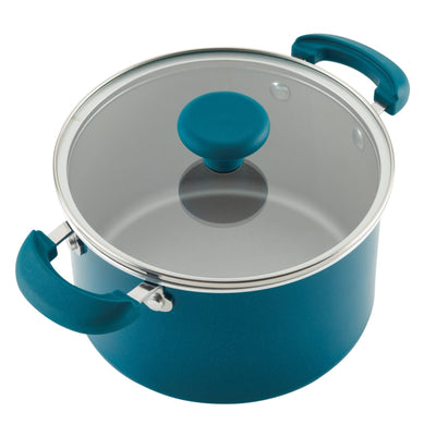 Blue cooking pot with glass lid and handles.