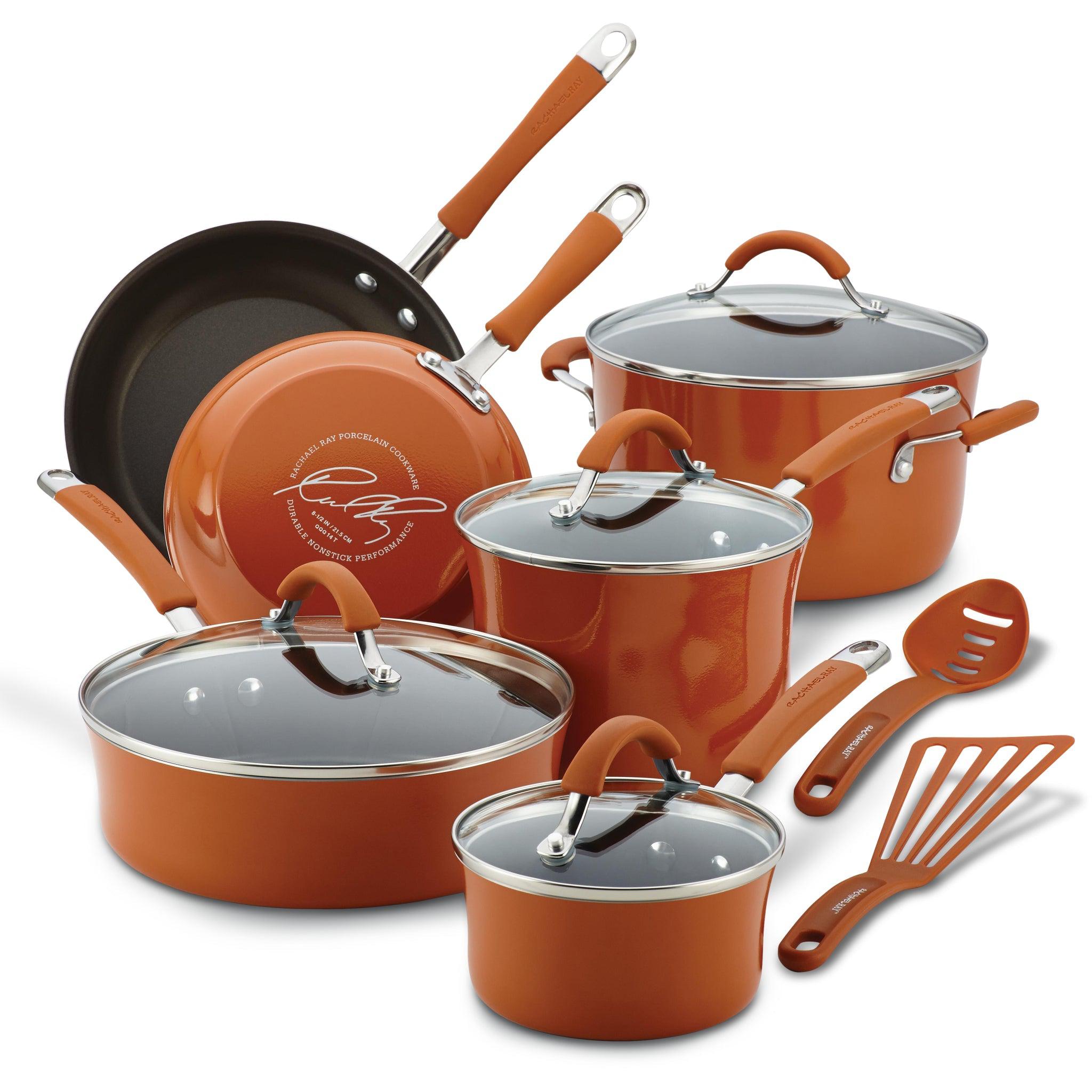 Set of copper-colored cookware with lids and utensils.
