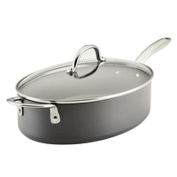 5-Quart Professional Hard Anodized Nonstick Oval Sauté Pan with Lid, featuring a glass lid and metal handle, ideal for preparing pasta on the stove top.