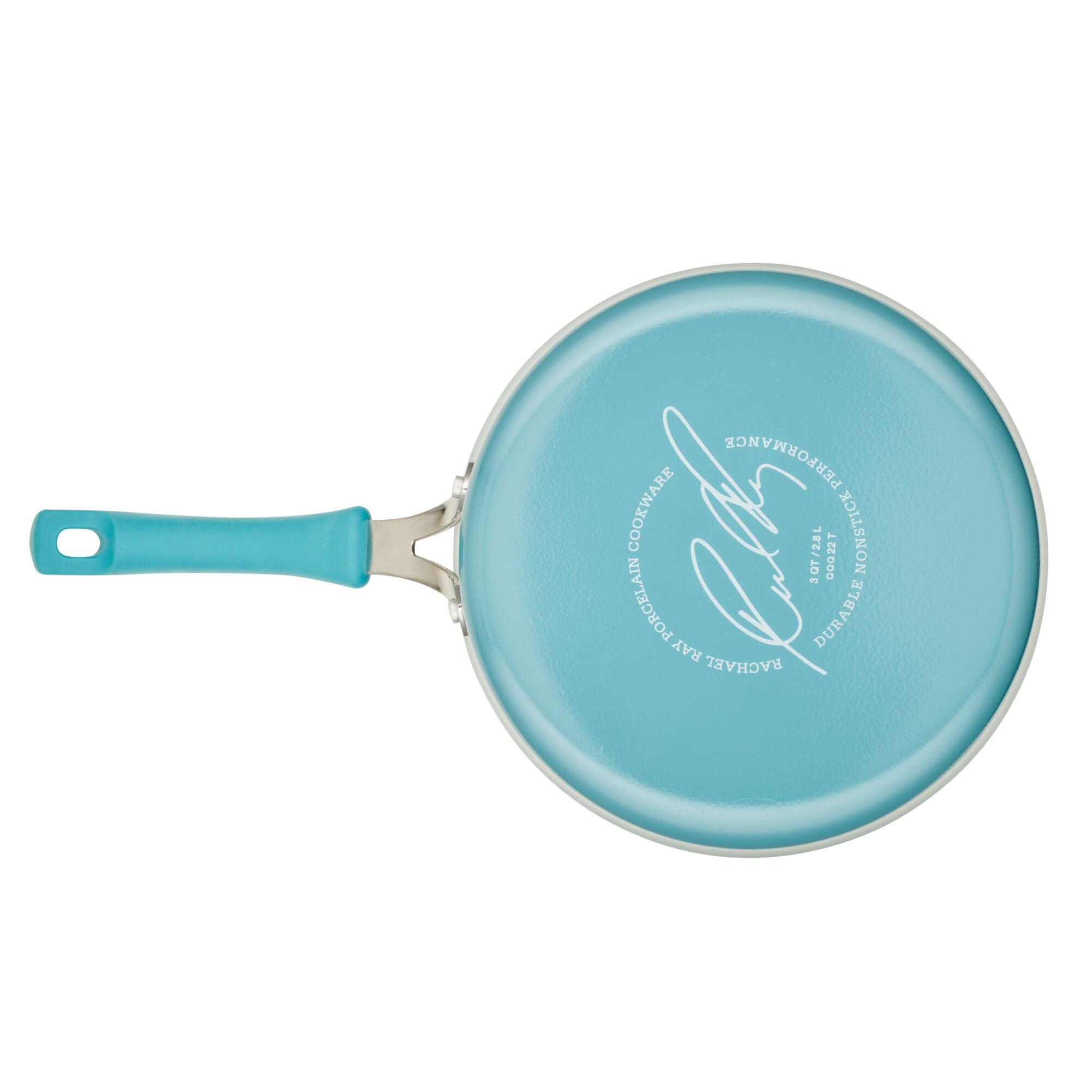 Viewed from above, the turquoise 3-Quart Cook + Create Nonstick Sauté Pan with Lid features a signature on the base. This stylish pan ensures easy cooking and cleanup.