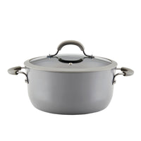 The 5-Quart Cook + Create Nonstick Dutch Oven with Lid, featuring a gray finish and convenient handles, is ideal for transitioning from stove to oven on a white background.