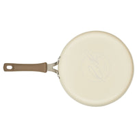 Top view of the 3-Quart Cook + Create Nonstick Sauté Pan with Lid, showcasing its beige color and brown handle, set against a white background.
