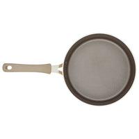 3-Quart Cook + Create Nonstick Sauté Pan with Lid, featuring a beige handle, as seen from above, ideal for sautéing and oven-safe to ensure versatile cooking options.