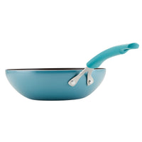 A 10.5-inch Cook + Create Nonstick Open Stir Fry in turquoise aluminum featuring a matching nonstick handle, set against a white background.