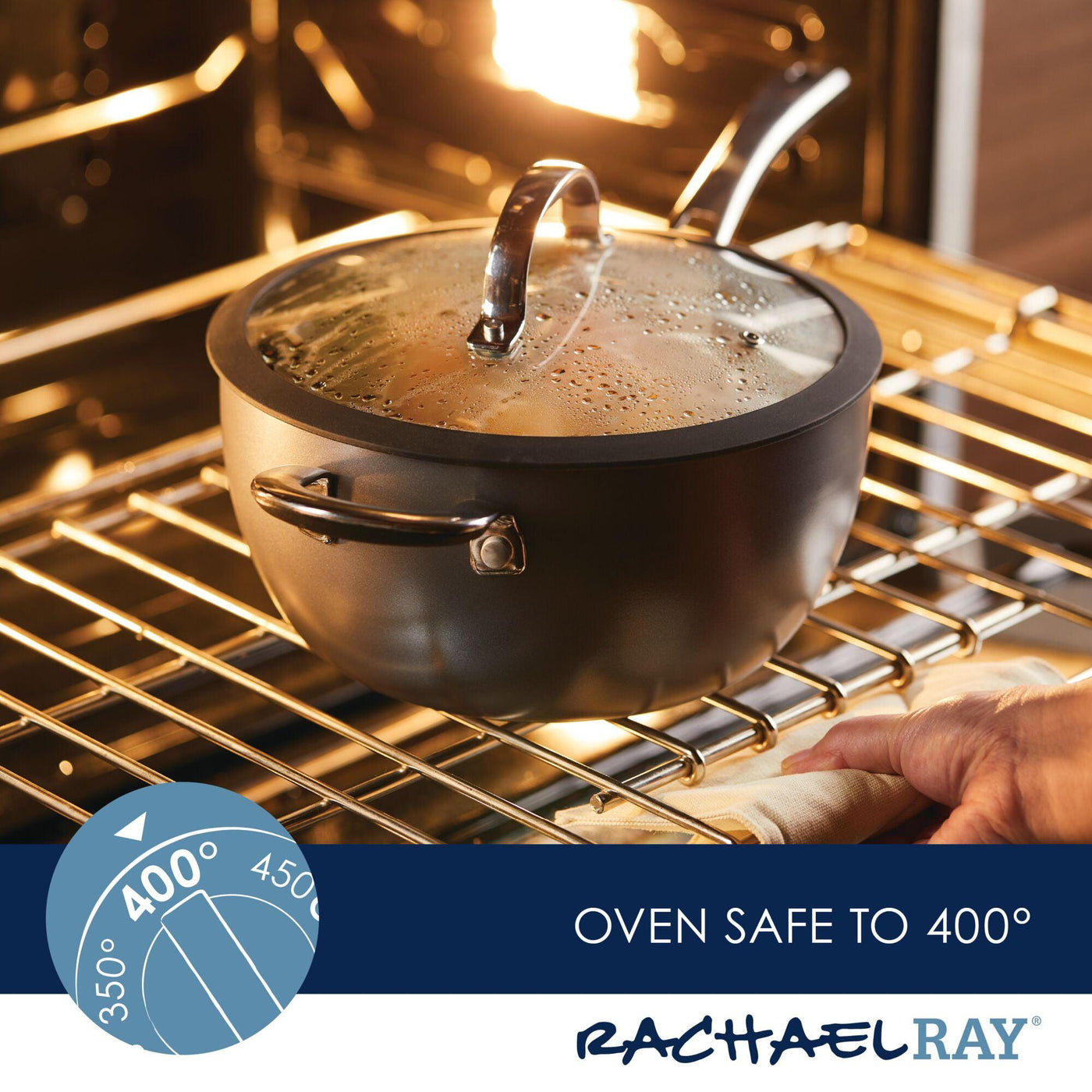 The 4.5-Quart Cook + Create Hard Anodized Nonstick Saucier Pan, complete with a lid and helper handle, confidently rests in the oven, demonstrating its oven-safe capabilities up to 400°F. Enjoy stress-free cooking with its triple-layer nonstick surface.
