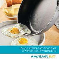 The 10-Piece Hard Anodized Nonstick Set slides two eggs onto a plate.