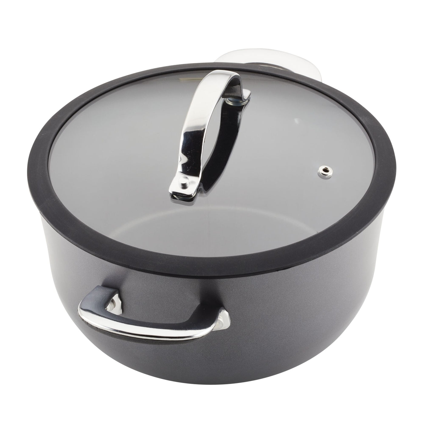 Experience the modern elegance of the Cook + Create Hard Anodized Nonstick Cookware, featuring a sleek black design with a tempered glass lid and silver handles, ideal for contemporary kitchens.