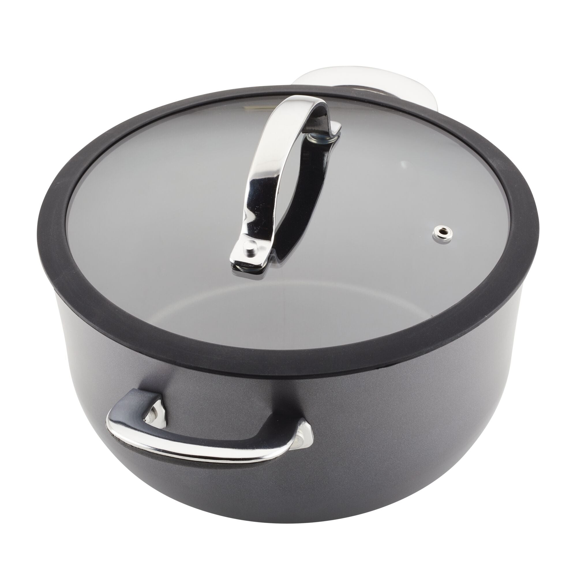 Experience the modern elegance of the Cook + Create Hard Anodized Nonstick Cookware, featuring a sleek black design with a tempered glass lid and silver handles, ideal for contemporary kitchens.