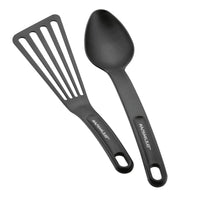 Black slotted spatula and spoon from the 10-Piece Cook + Create Hard Anodized Nonstick Cookware Set, ideal for nonstick cookware, elegantly displayed on a white background.