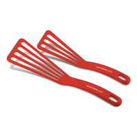 Two slotted spatulas from the 10-Inch & 12-Inch Nylon Spatula Set, featuring branded handles in red, lie side by side.