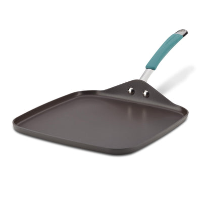 The 11-Inch Cucina Hard Anodized Nonstick Square Griddle, featuring a teal handle, guarantees effortless food release for easy cleanup.