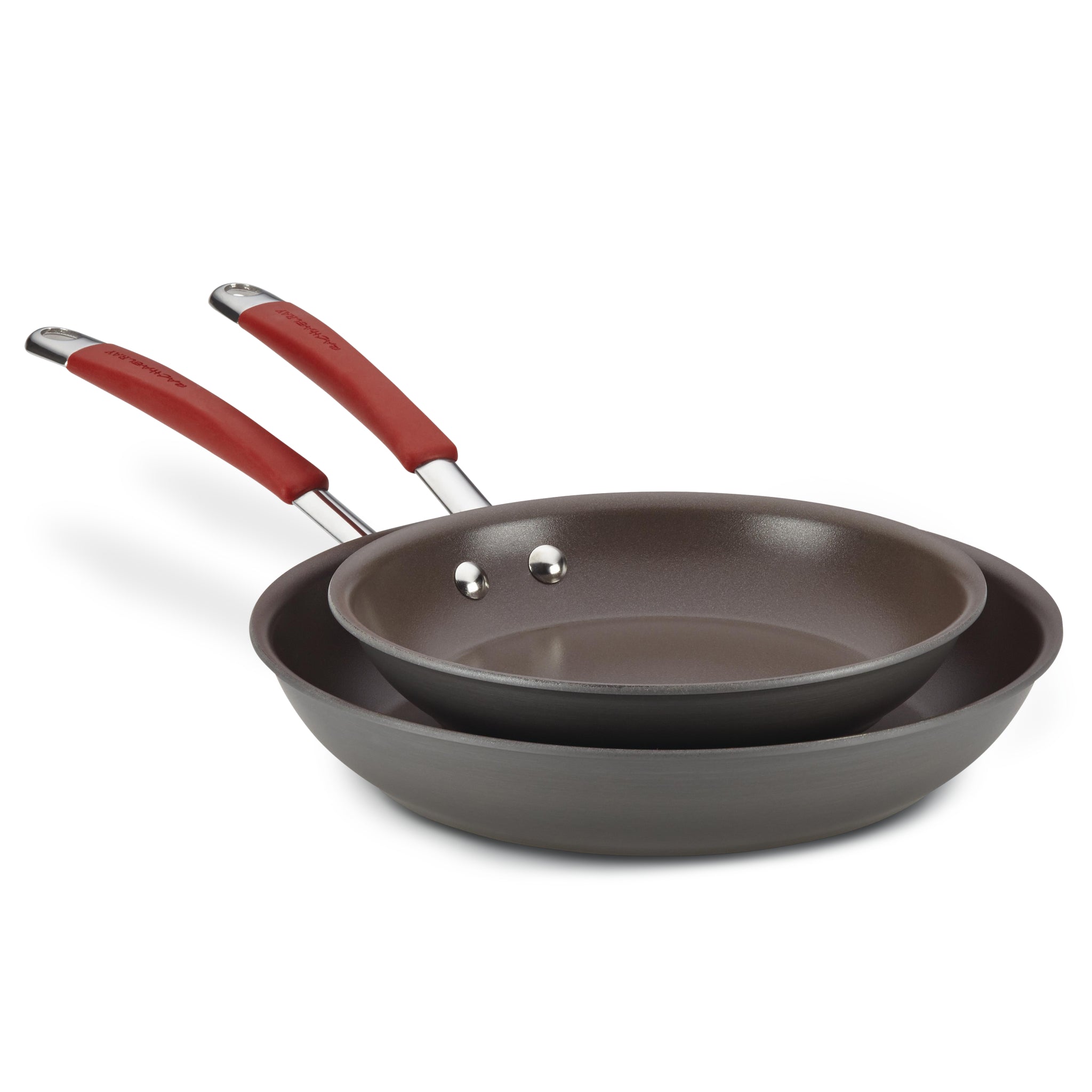 The 9.25" and 11.5" Cucina Hard Anodized Nonstick Frying Pan Set features two frying pans with oven-safe red handles, stacked on top of each other.