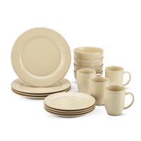The 16-Piece Dinnerware Set in beige ceramic, including handcrafted textured plates, bowls, and mugs, is elegantly arranged and dishwasher safe for easy cleaning.