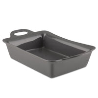 9-Inch x 13-Inch Ceramic Baker in gray, featuring a rectangular shape and a handle on one end, ideal for baking casseroles with its oven-safe design.