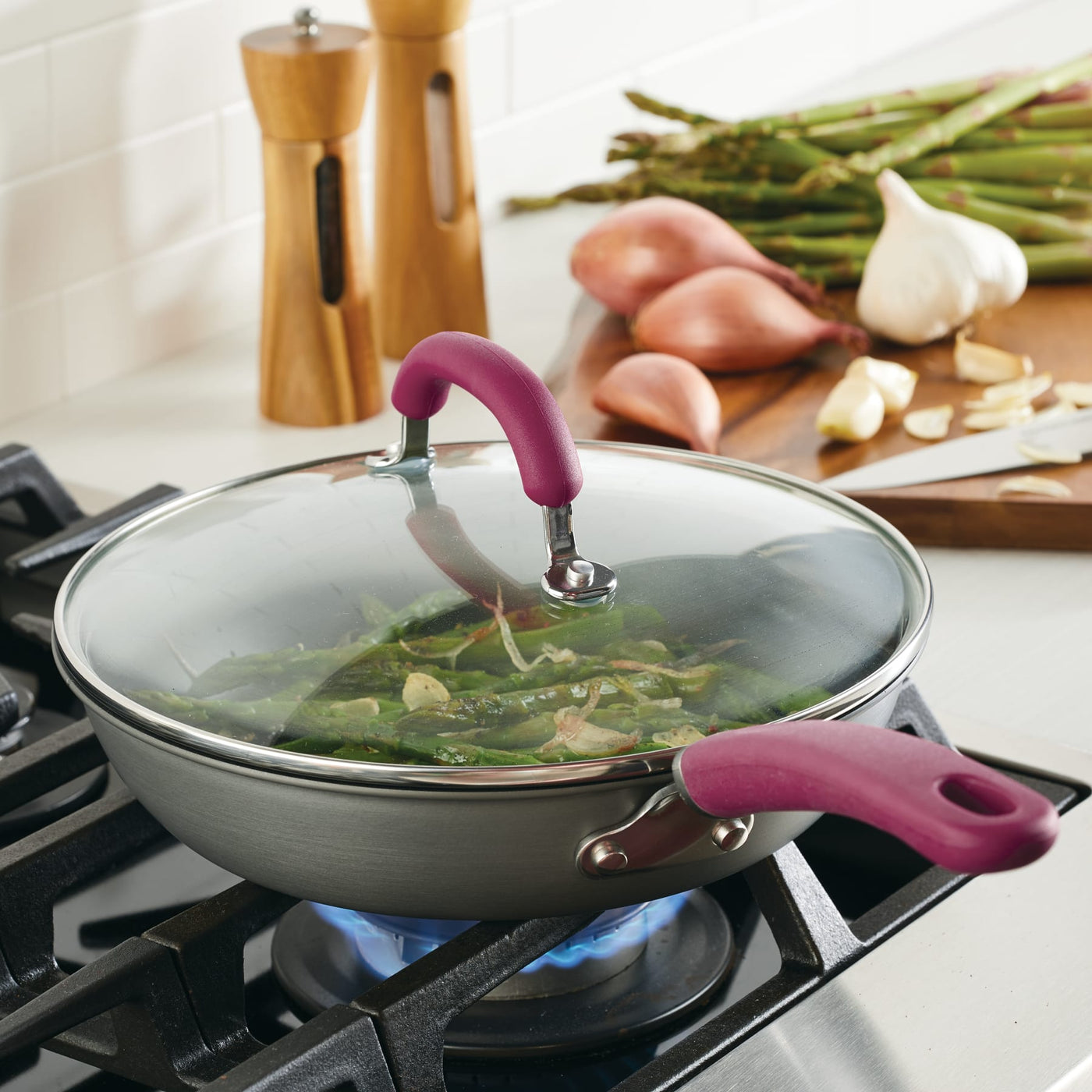 The 10.25-Inch Nonstick Induction Frying Pan with lid steams veggies easily.