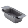 The 9-Inch x 5-Inch Nonstick Loaf/Meatloaf Pan features a heavy gauge steel construction with a perforated base, large handles, and is safe for use in the oven, making it perfect for preparing nonstick meatloaf.