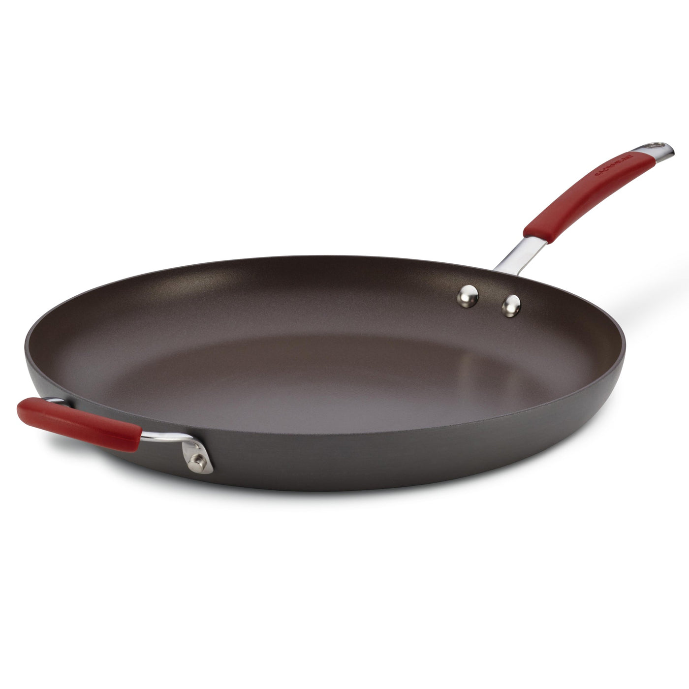 The 14-Inch Cucina Hard Anodized Nonstick Frying Pan with red handles, including a helper handle, is displayed against a white backdrop, highlighting its sleek design. This hard anodized frying pan is oven safe, catering to versatile cooking needs.