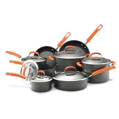 The 14-Piece Classic Brights Hard Anodized Nonstick Cookware Set features vibrant orange handles and is made from hard-anodized aluminum for durability. Each piece includes a lid and is oven safe, making it perfect for versatile cooking.