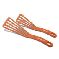 Two slotted turners, measuring 10 inches and 12 inches, are part of the Nylon Spatula Set and feature orange handles with text on them.