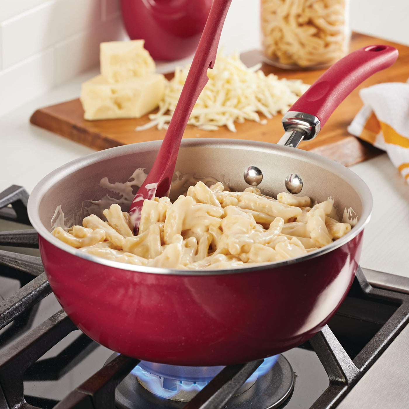 Macaroni and cheese cooking in a 3-Quart Nonstick Covered Chef Pan on stove.