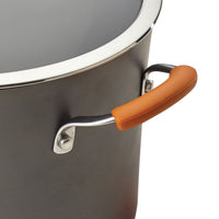 Close-up of a pot from the 12-Piece Cucina Hard Anodized Nonstick Cookware Set, featuring an orange handle that highlights its durable aluminum construction for long-lasting performance.
