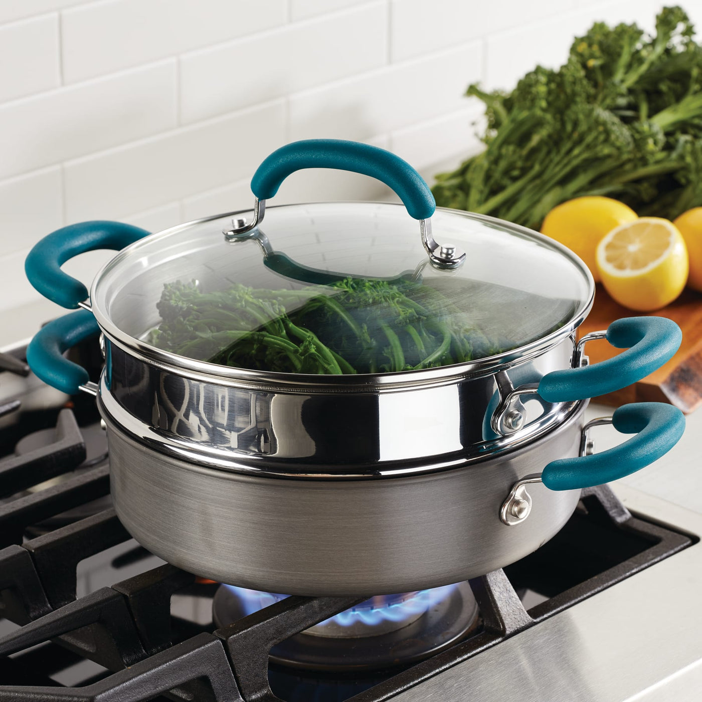 The 3-Quart Hard Anodized Nonstick Induction Steamer Set steams veggies.