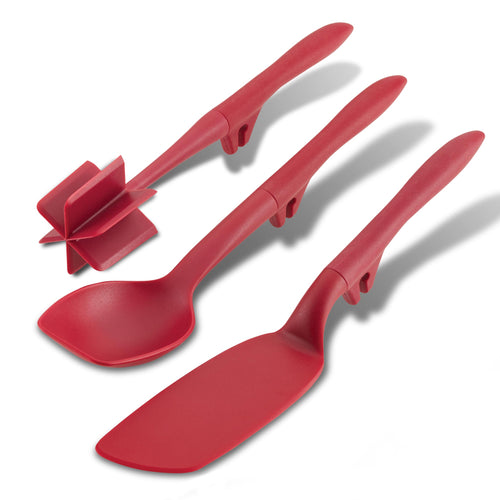 A 3-piece Lazy Tool Set, including Crush & Chop and Turn utensils, in a striking red nylon hue is displayed gracefully on a clean white surface.