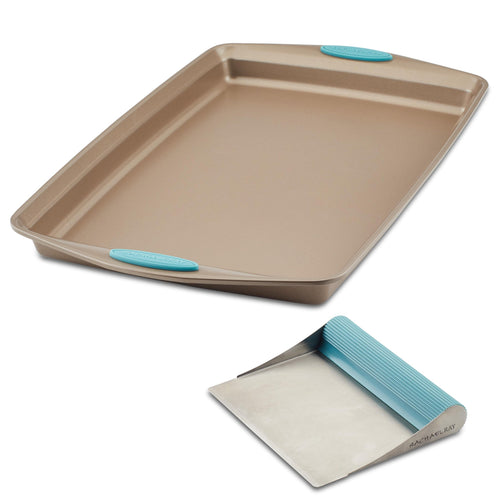 Nonstick baking sheet and bench scrape set featuring blue silicone grips.