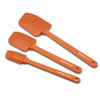 A set of three orange nylon spatulas of different sizes, ideal for your kitchen utensil collection, featuring "Rachael Ray" printed on the handles, known as the 3-Piece Lil' Devils Spatula Set.