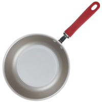 3-Quart Nonstick Induction Chef Pan with red handle, top view on white.